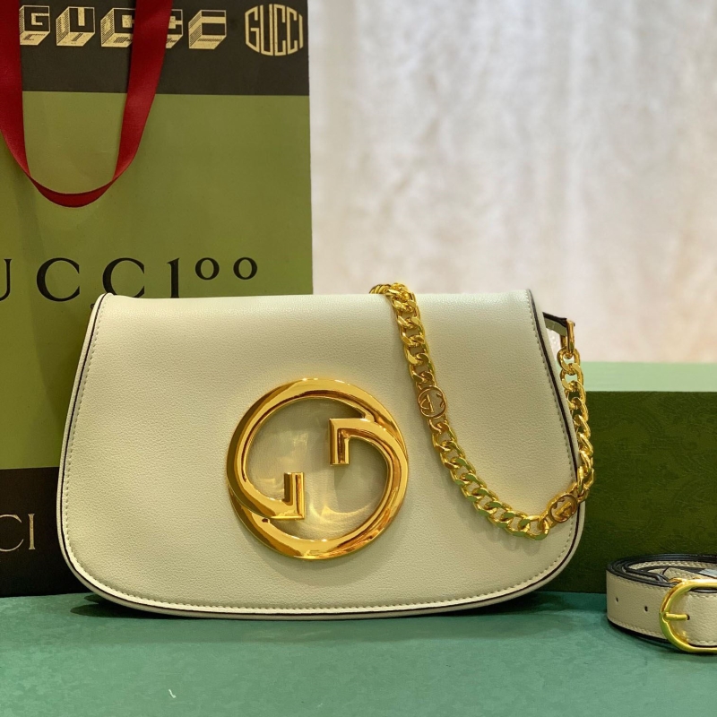 G*u*i shopping bags